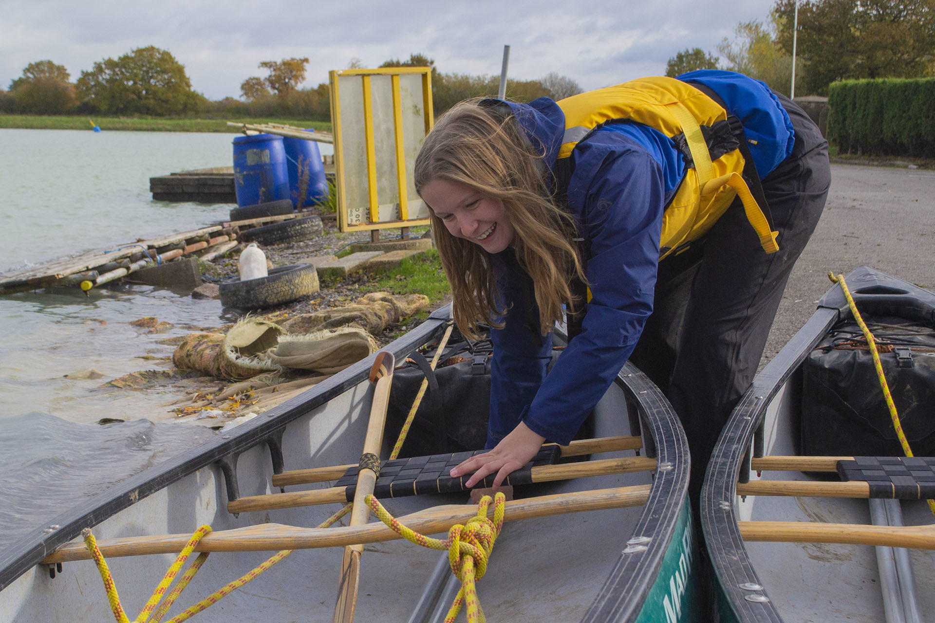 Outdoor Pursuits. Student preparing canoe