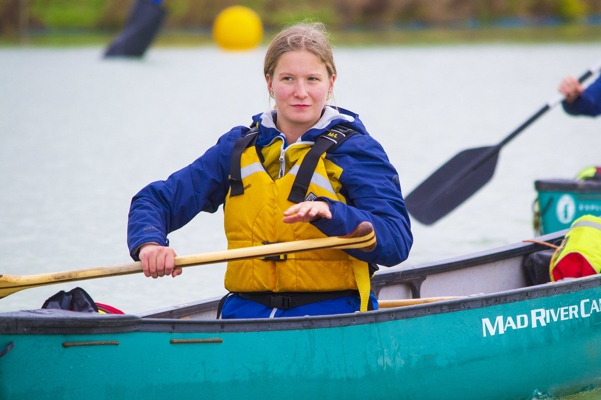 Outdoor Pursuits. Student paddling a canoe