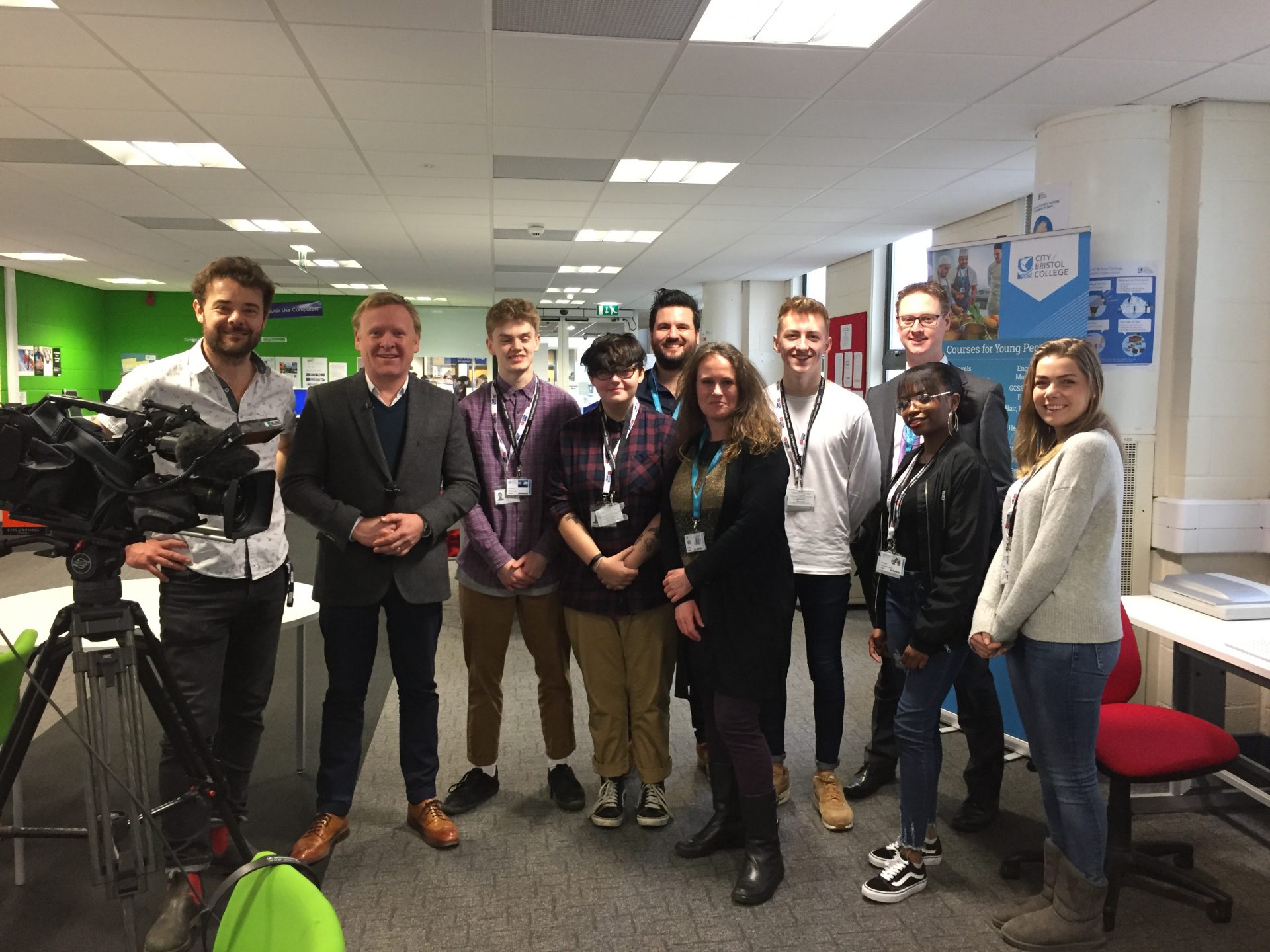 BBC Breakfast presenter, John Maguire, and students of City of Bristol College students standing next to camera equipment