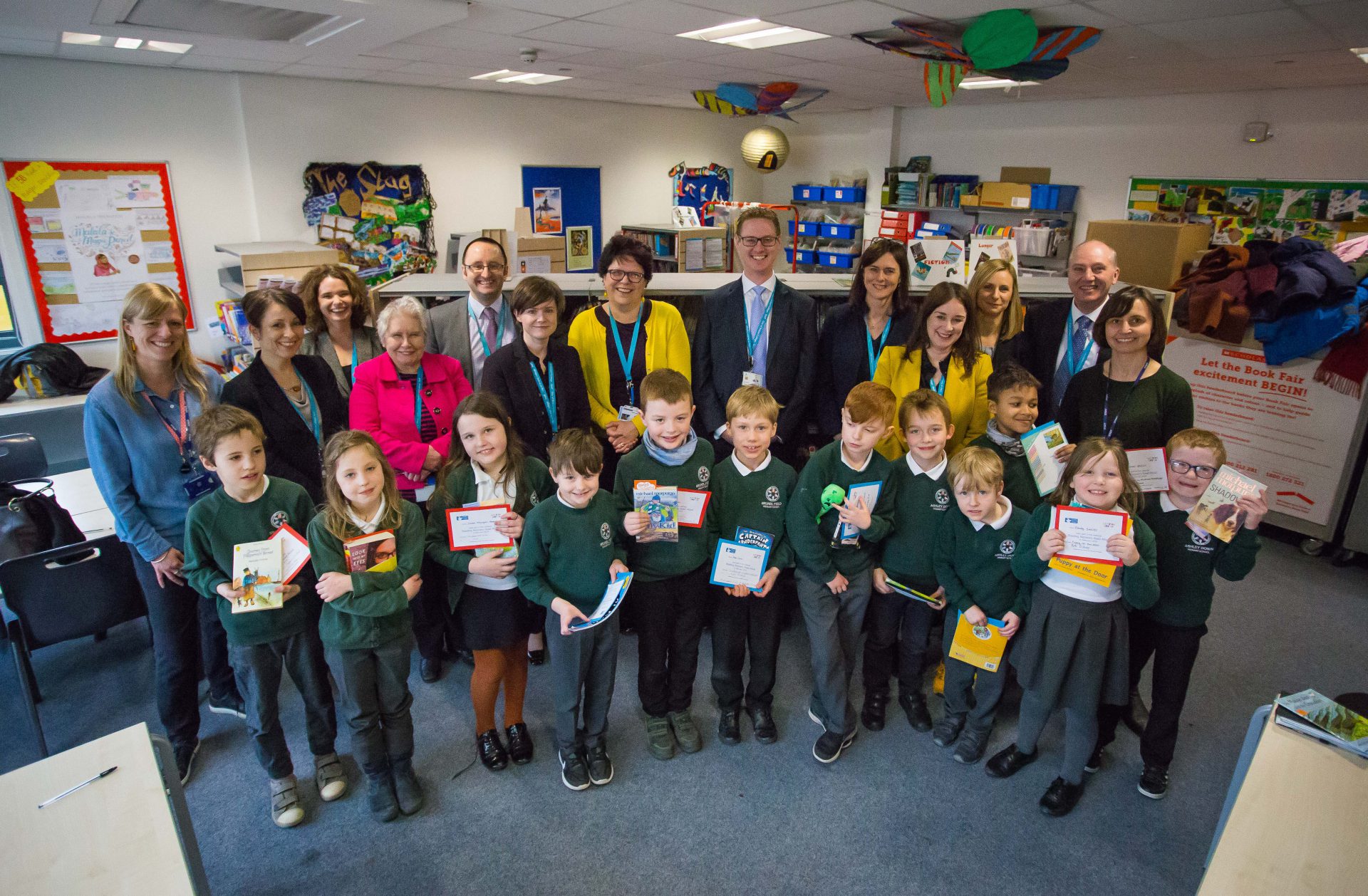 Students and teachers of Brunel Field Primary School, Bristol holding books