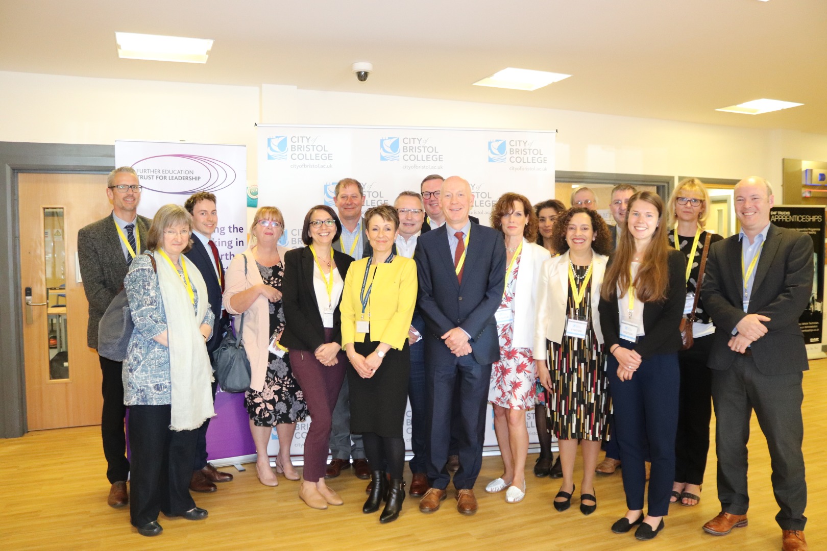 Staff of City of Bristol College stand with participants of a ‘Future of the Skills System’ roundtable