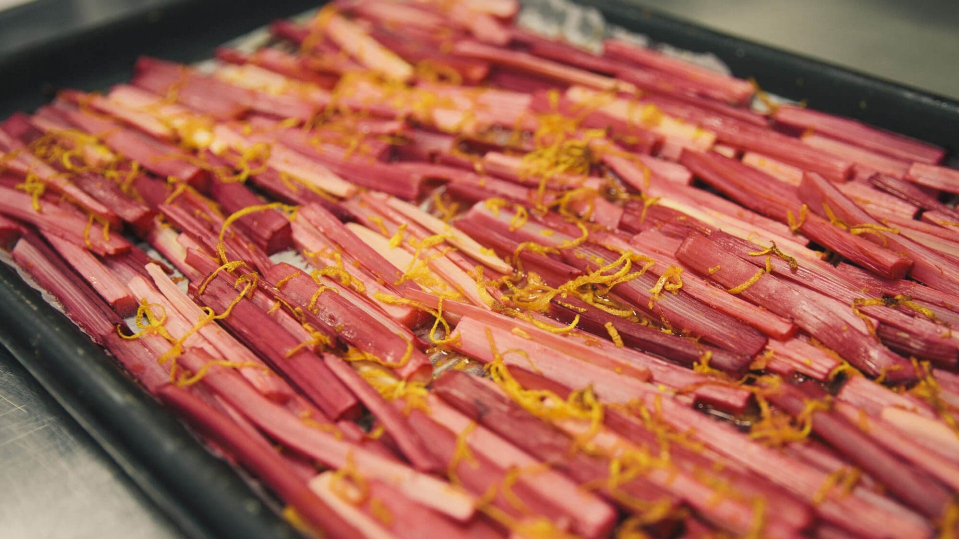 Rhubarb lines a baking tray for catering courses