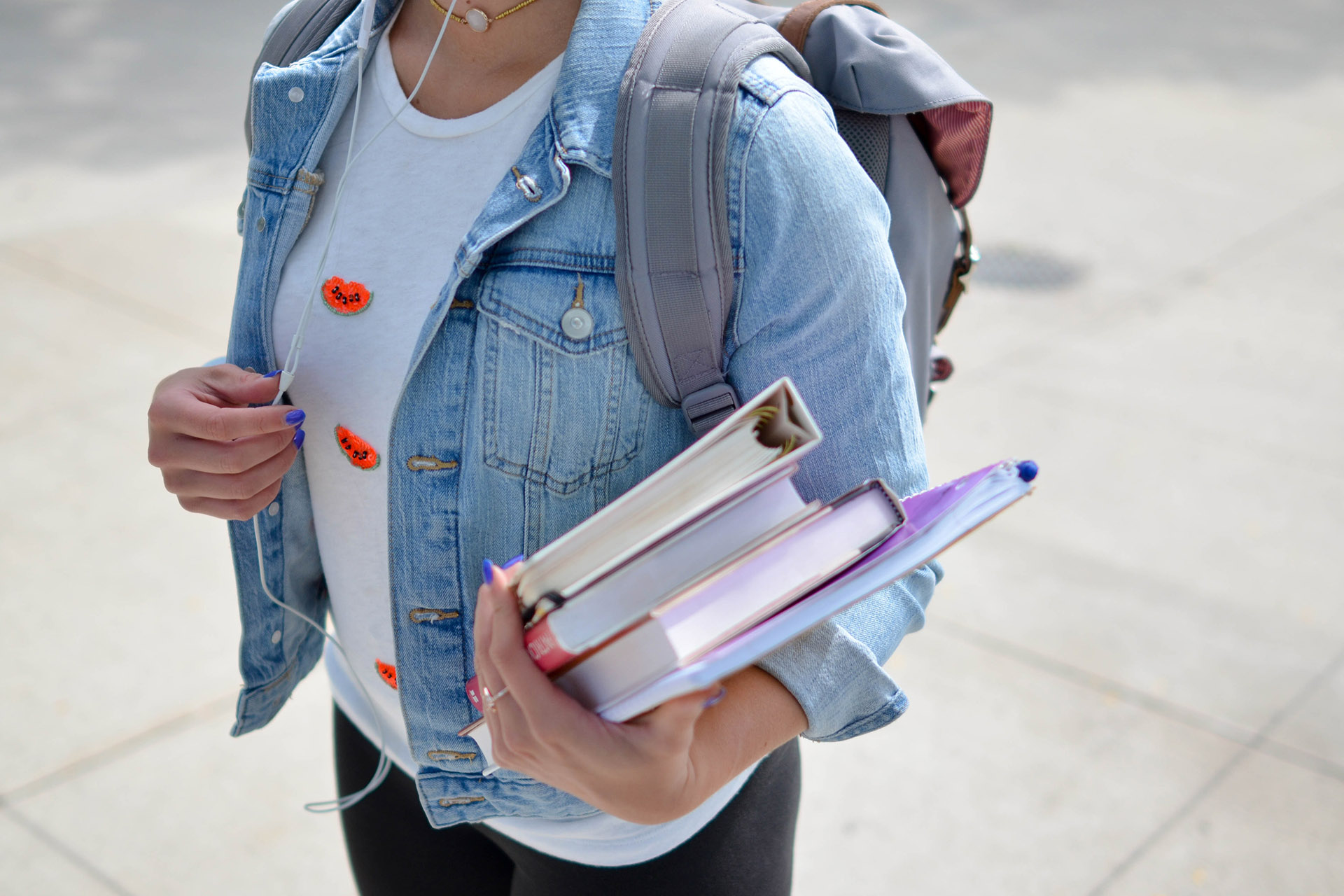 Female student carrying books