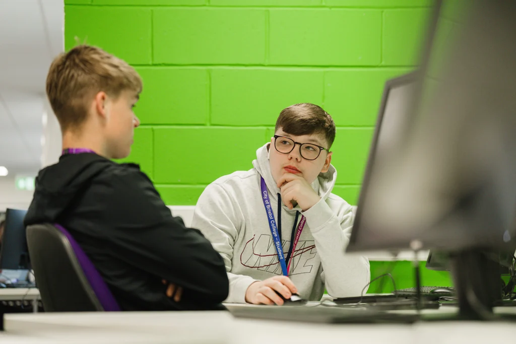 two young male students talking