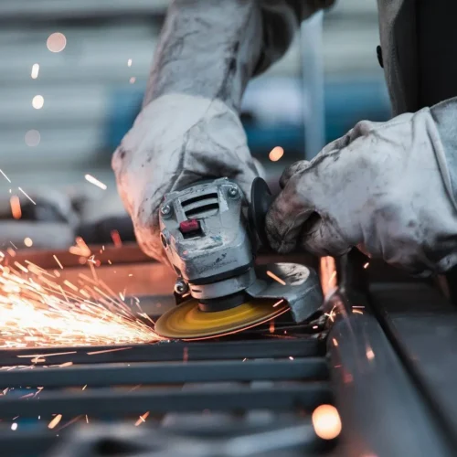 person using a power tool