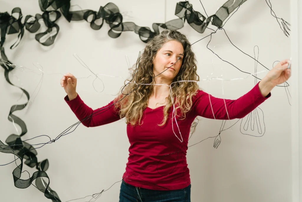 Art student working with wires for a project