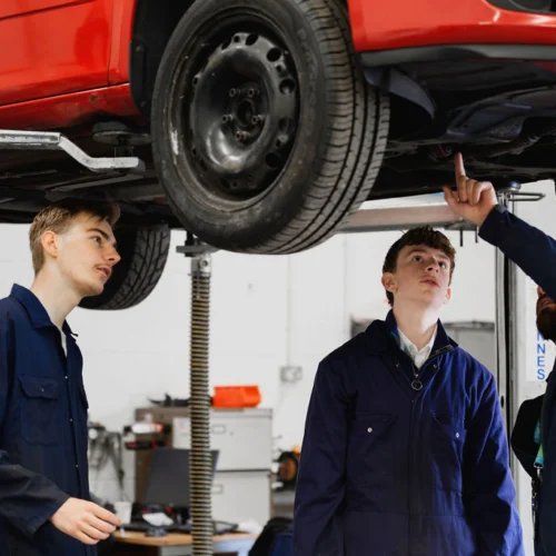 Students pictured in the Motor Vehicle workshop.