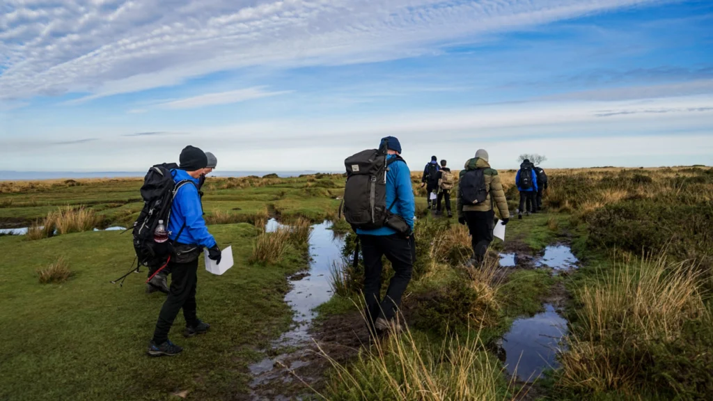Image shows Sport Outdoor Adventure students exploring on a walk.