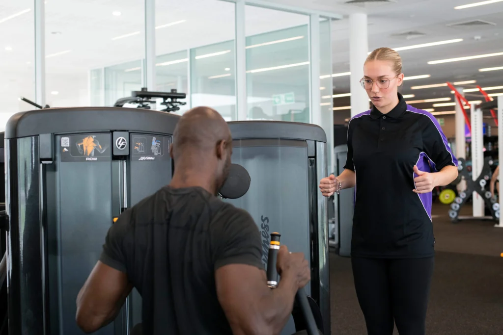 Fitness student pictured in a gym environment.