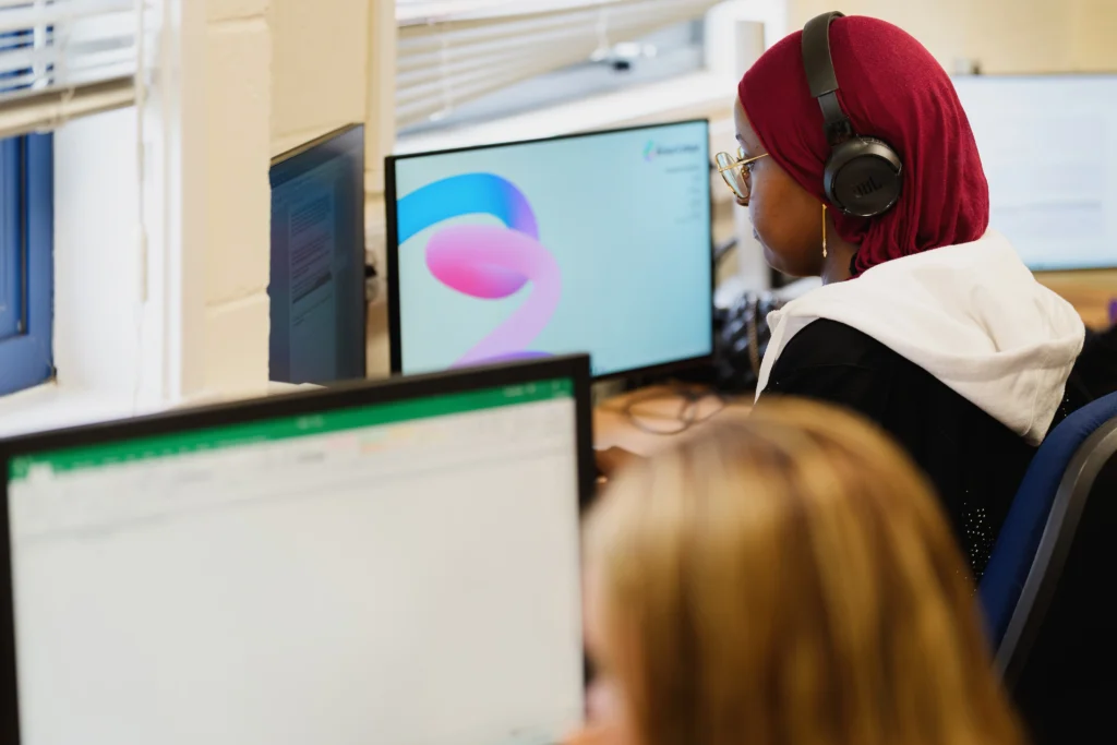 Two students using a computer