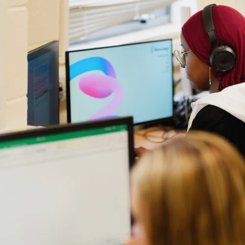 Two students using a computer
