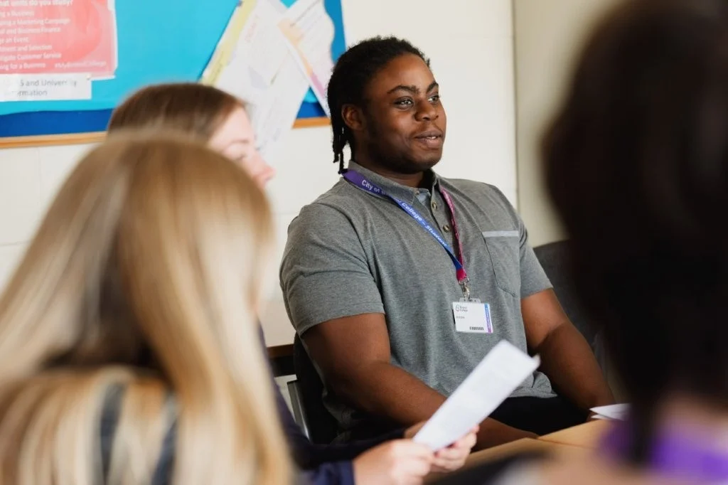 Student in class reacting to question