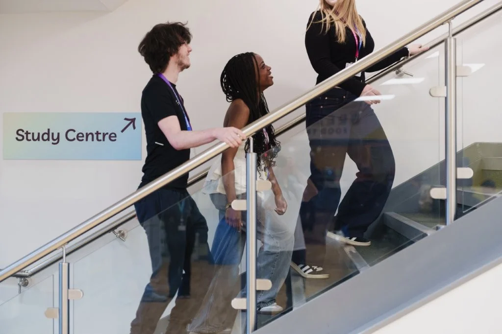 Students walking up stairs