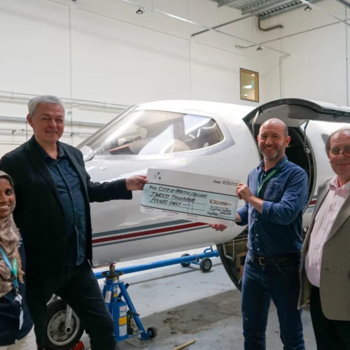 Image shows Clifton Rocks Railway Trust trustees visiting the Advanced Engineering Centre and presenting the college with a donation cheque of £20,000.