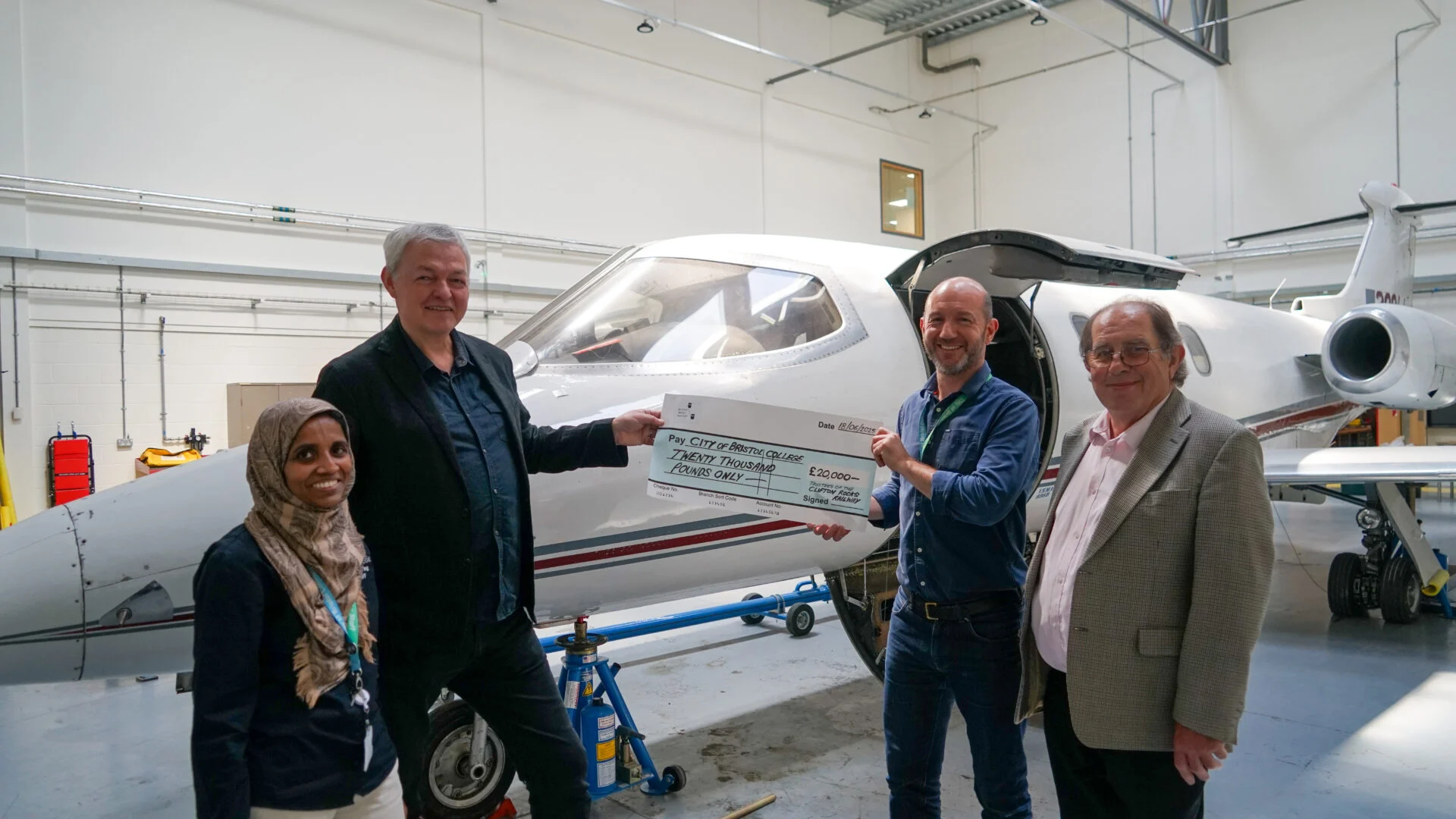 Image shows Clifton Rocks Railway Trust trustees visiting the Advanced Engineering Centre and presenting the college with a donation cheque of £20,000.