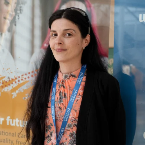 Image shows Sarah, a Partners in Bristol learner turned IT Tutor pictured outside of Partner in Bristol's 'Launchpad' in The Galleries, Bristol.