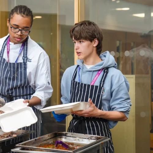 Students learning catering