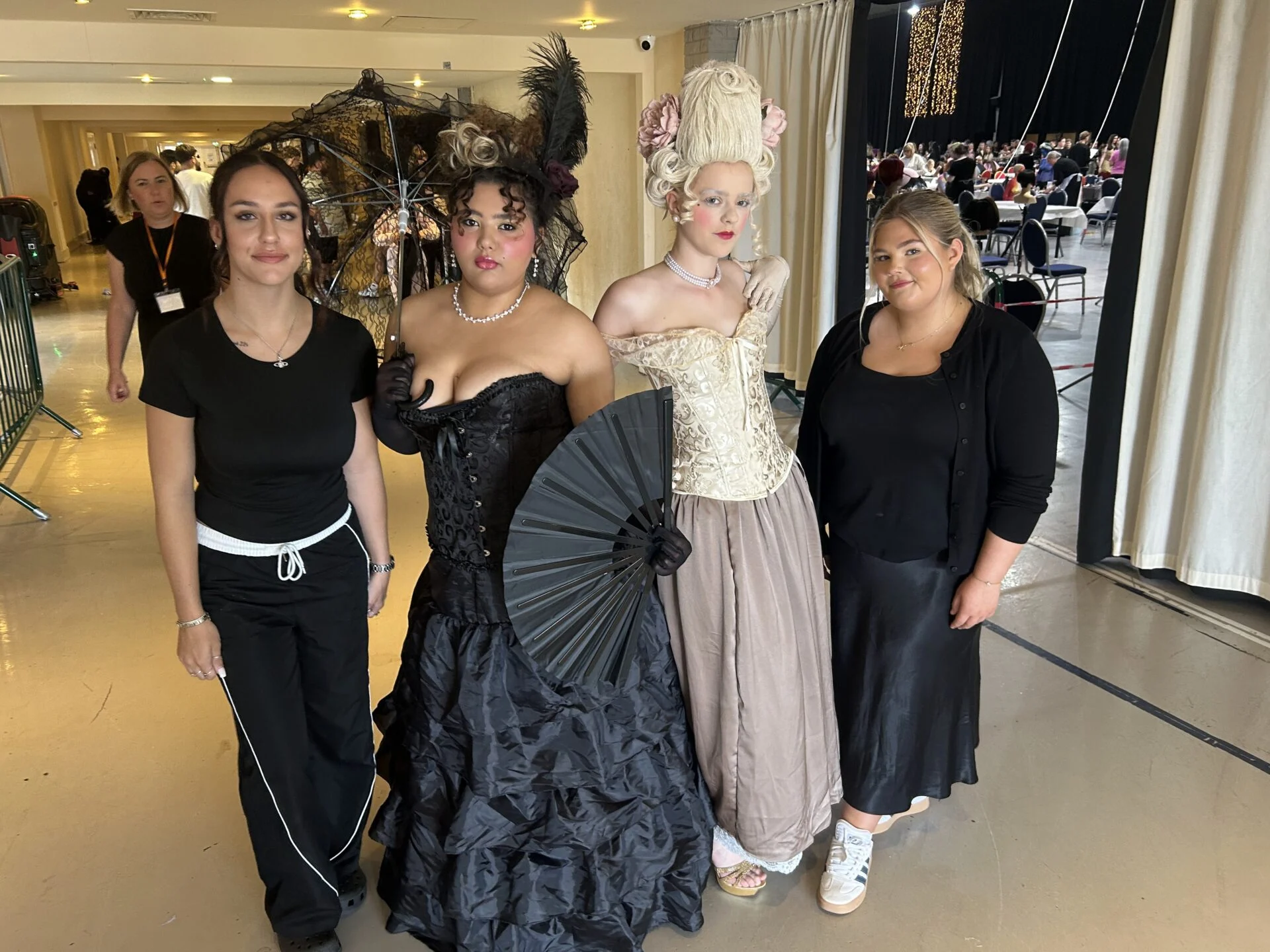 Students model creative work from Make up and Hair students at regional competition.