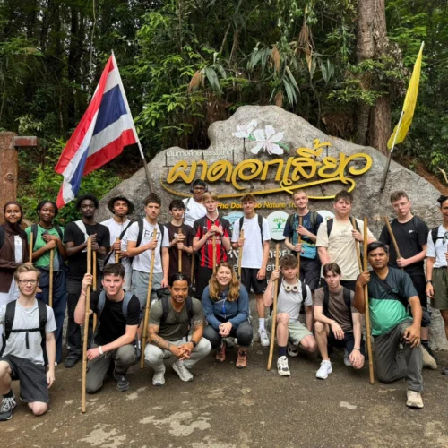 Students pictured as part of a college trip to Thailand.