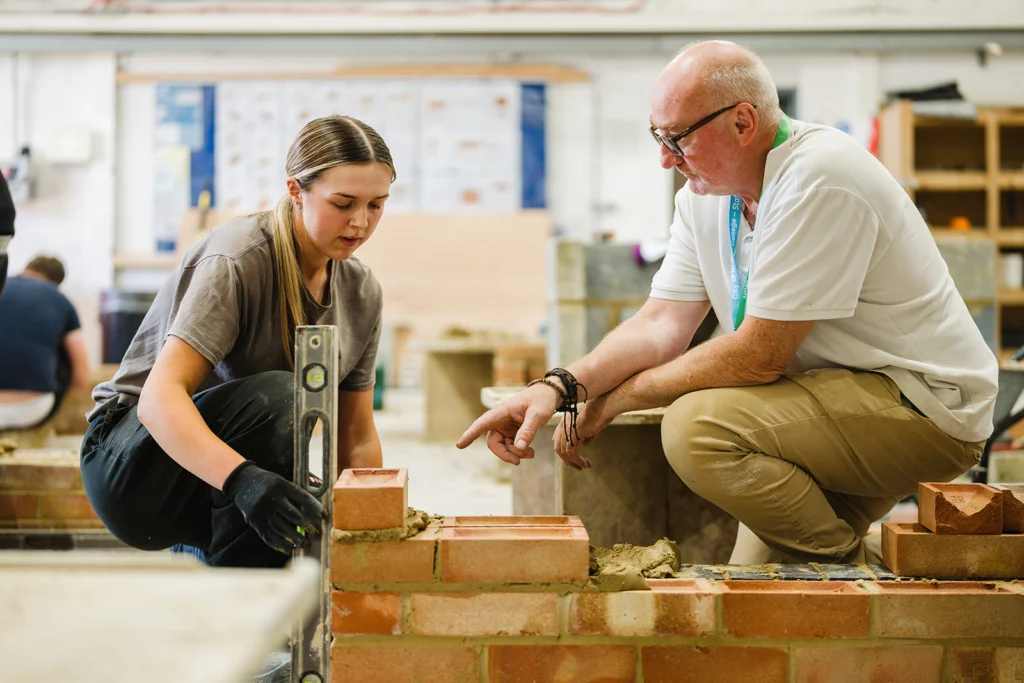student learning brick laying
