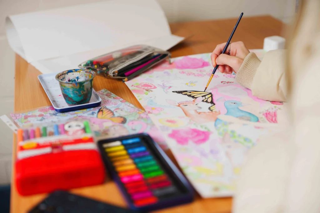 Someone painting a colourful painting